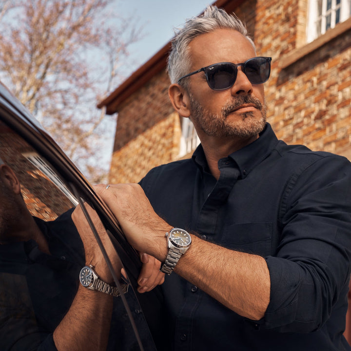 Cestrian Master Series CM-GB001 outdoor lifestyle shot of model wearing green dial automatic watch by car window