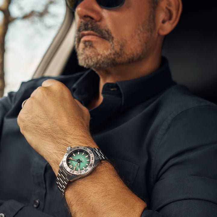 Cestrian Ocean Series CO-BGS001 lifestyle shot of watch with green fumé dial worn on wrist inside car