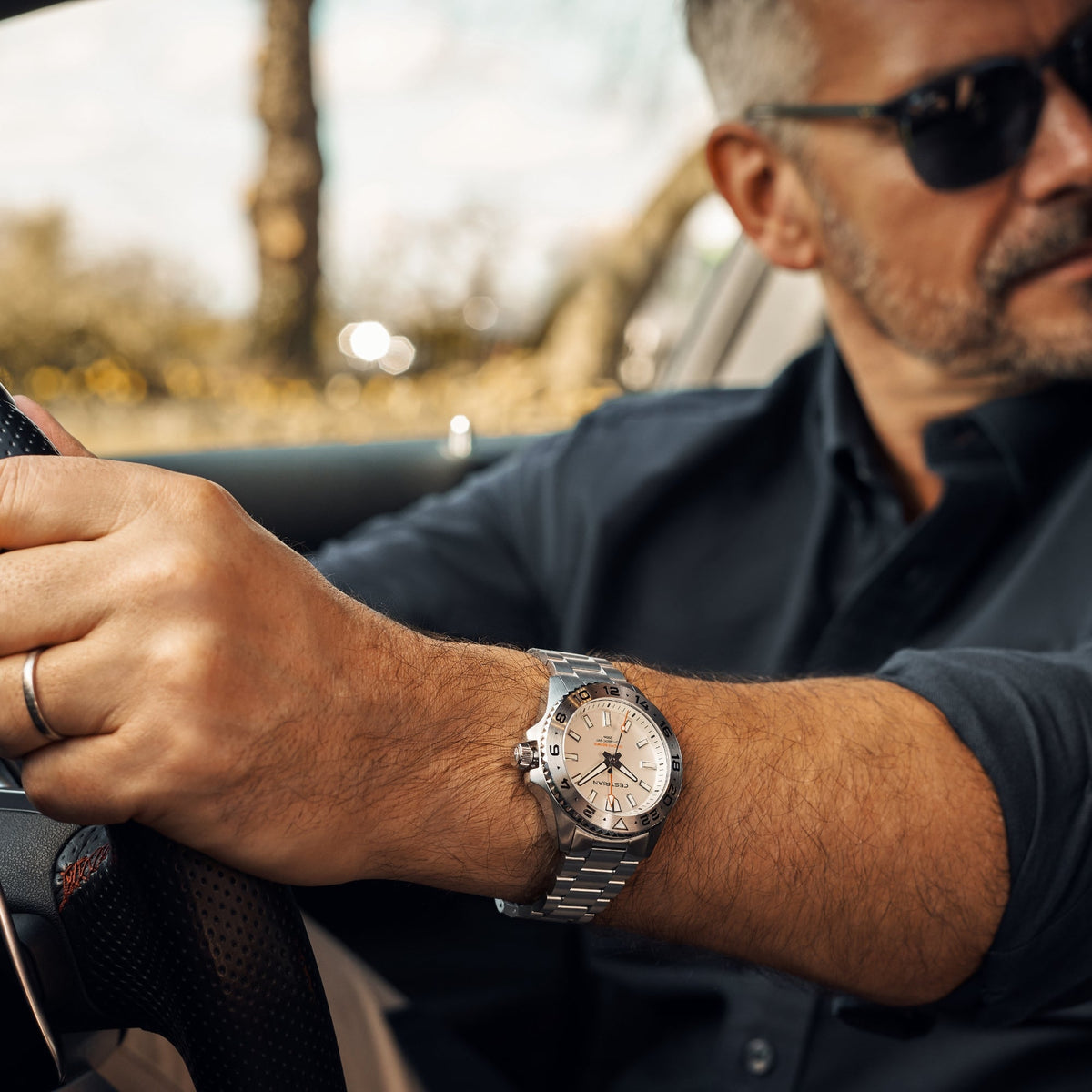 Cestrian Ocean Series CO-SWS001 lifestyle view of model wearing silver white dial watch while driving