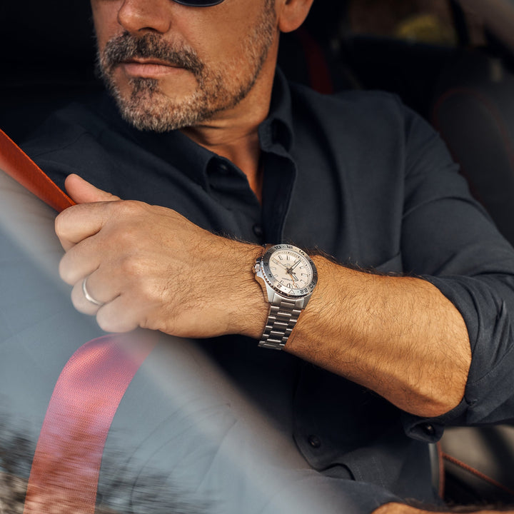Cestrian Ocean Series CO-SWS001 lifestyle shot of model wearing silver white dial automatic watch inside a car