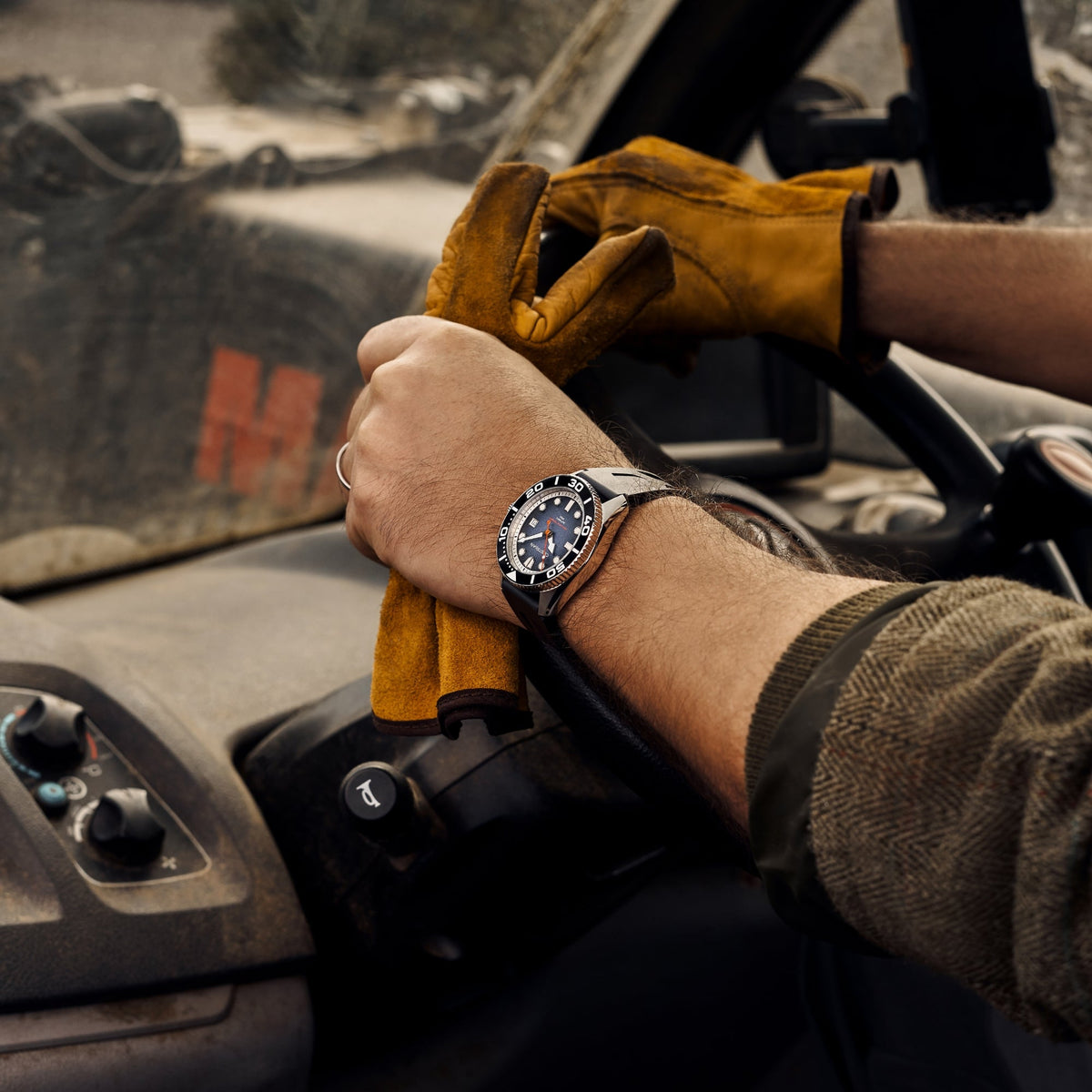 Cestrian Pro Dive Series CP-BLB002 action shot of watch with blue fumé dial worn on wrist while holding steering wheel